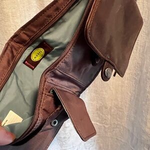 Mosey crossbody on the go bag/wallet. Brown and leather.
